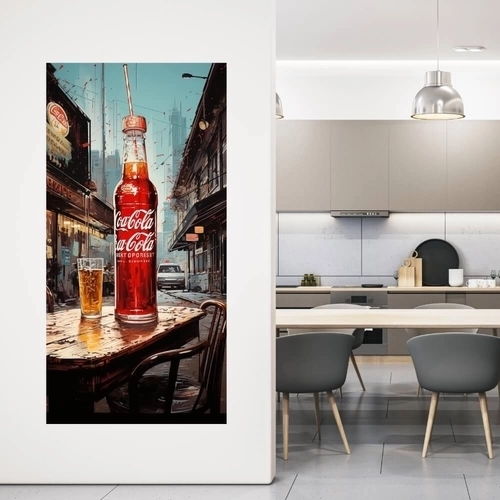 Selvklæbende plakat En flaske coca cola står på et bord ved siden af ​​et glas