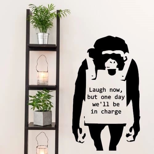 Wallsticker med Banksy motiv og tekst.
