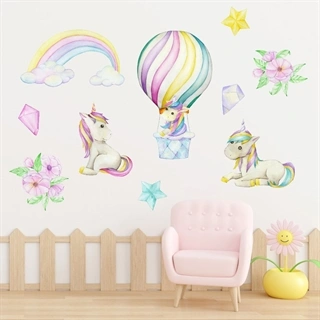 Wallstickers ark med enhjørning i lyftballoner, regnbue og stjerner